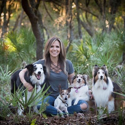 Dog waker with her four dogs in Clearwater.