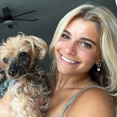 Woman pet sitting a dog